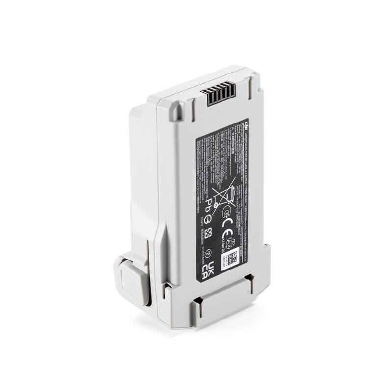 Metallic device with a label on a white background