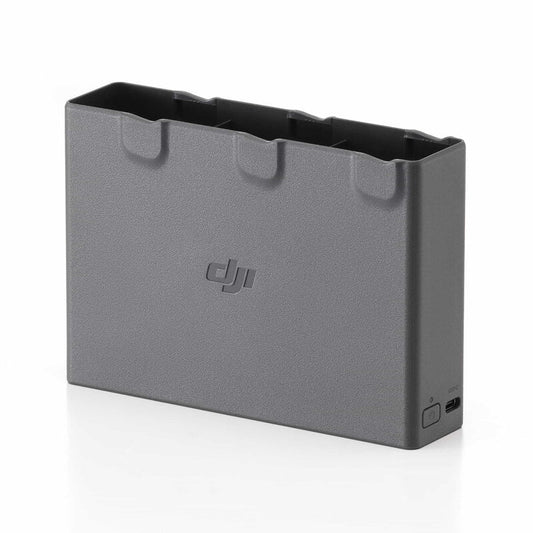 Gray battery charger with DJI logo on a white background
