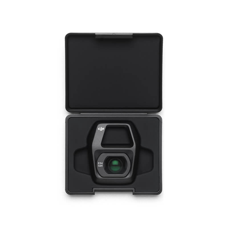 Black camera in open case on a white background