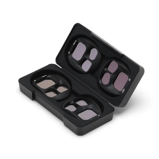 Black eyeglass case with multiple lenses on a white background