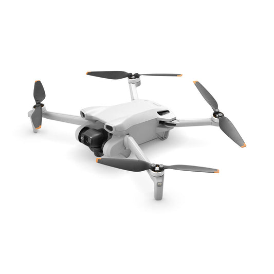 DJI Mini 3 White drone with four propellers on a white background