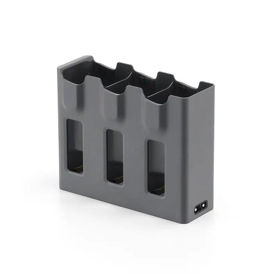 Gray battery holder with multiple slots on a white background