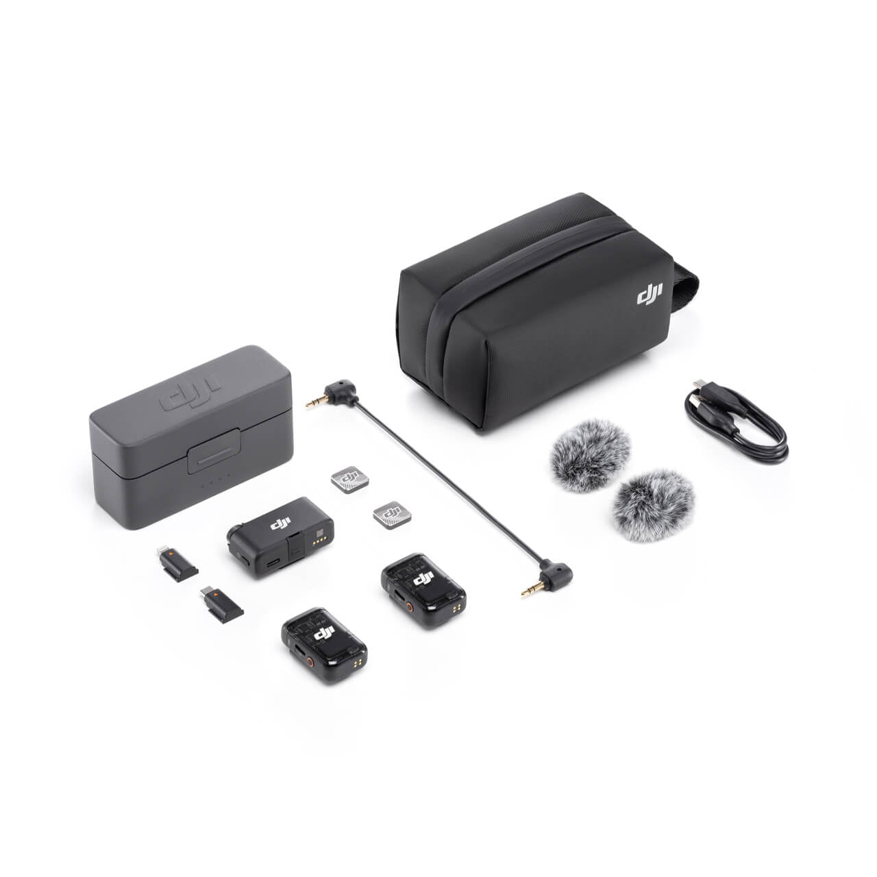 Collection of DJI Mic 2 equipment and accessories on a white background