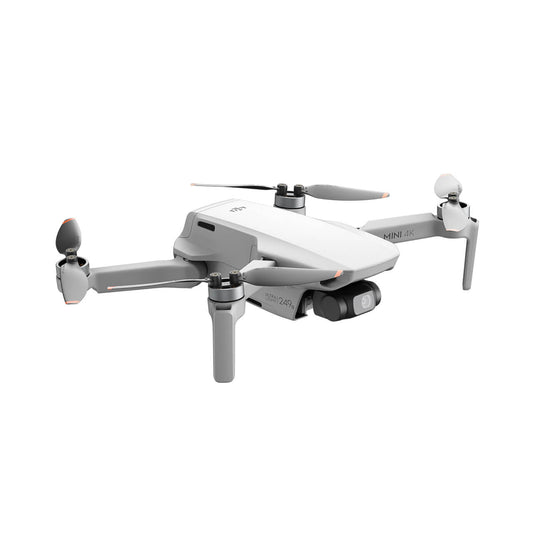 DJI mini 4K White drone with propellers on a white background