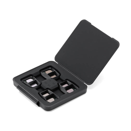 Black plastic component set in an open black case on a white background
