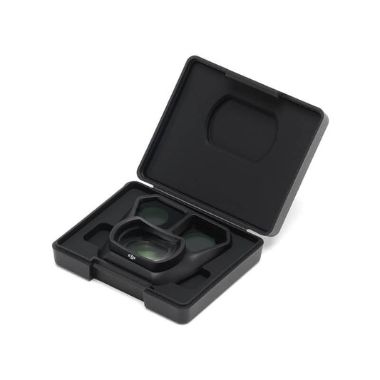 Black camera lens filter set in a case on a white background