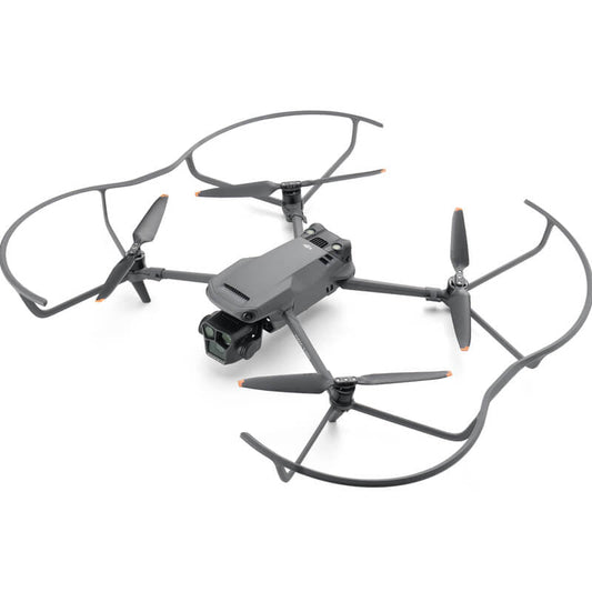 Black drone with propellers on a white background