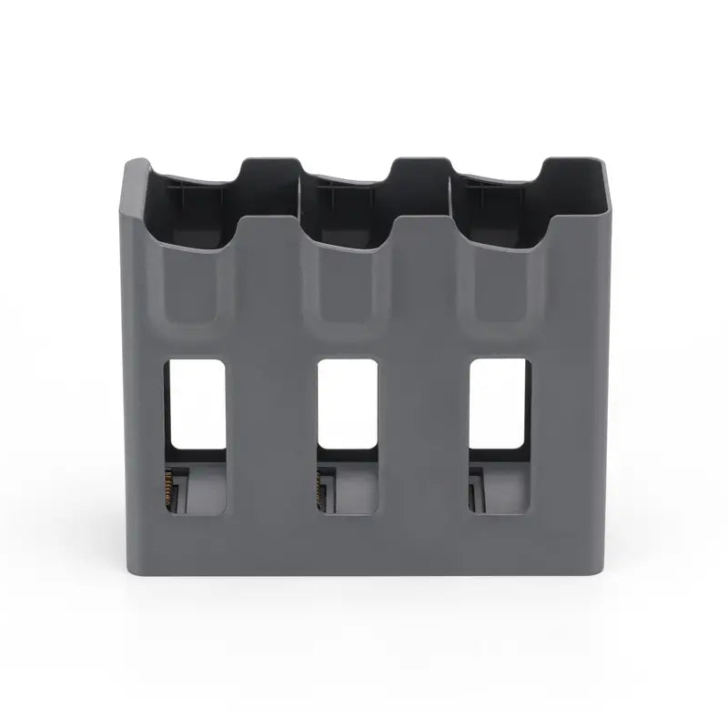 Gray plastic holder with multiple slots on a white background