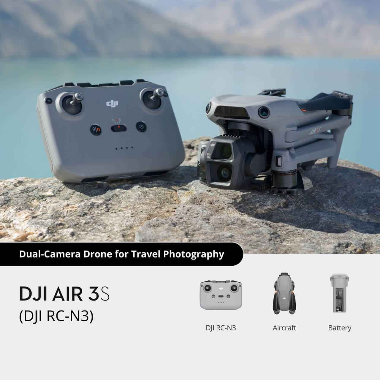 DJI AIR 3S drone and remote control on a rock with a scenic background