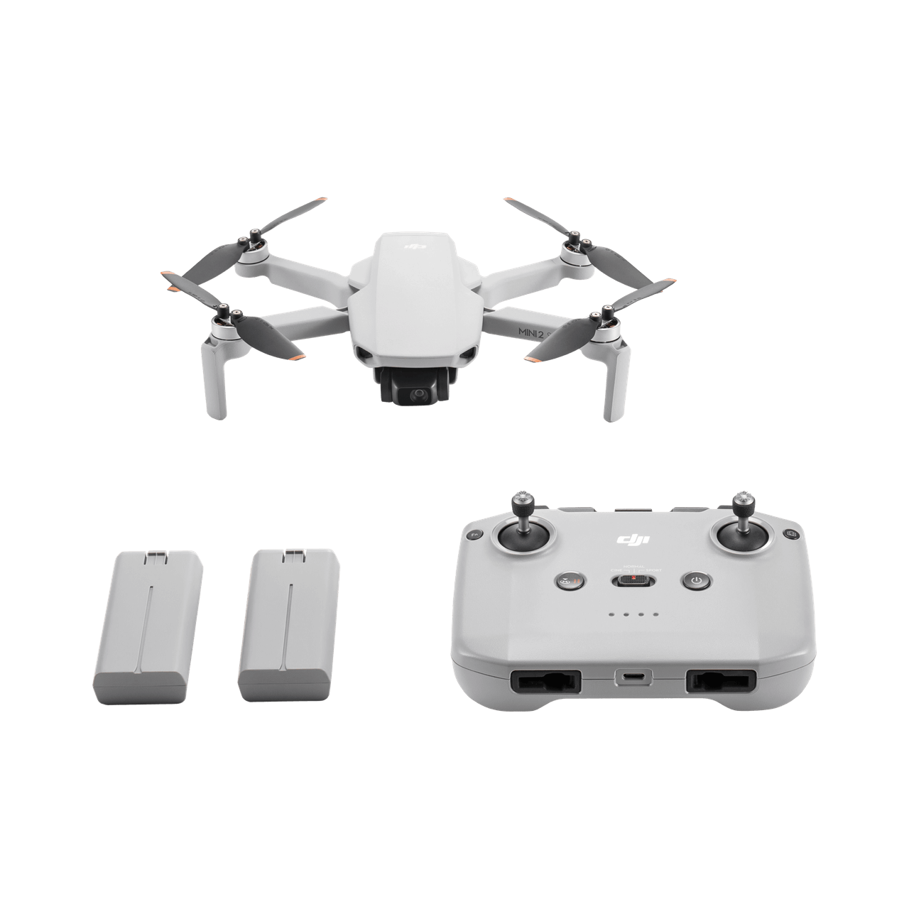 DJI Mini 2 SE White drone with remote control and batteries on a black background