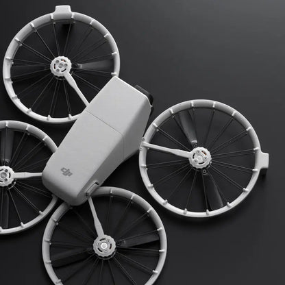Model of a dji flip with large wheels on a dark background
