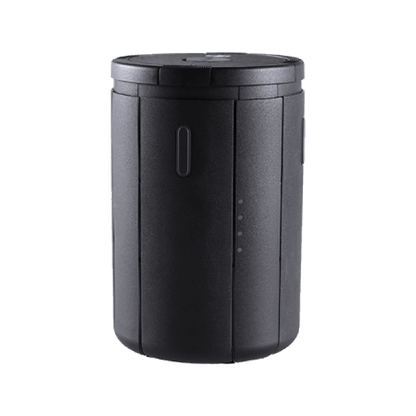 Black cylindrical container with a lid on a white background