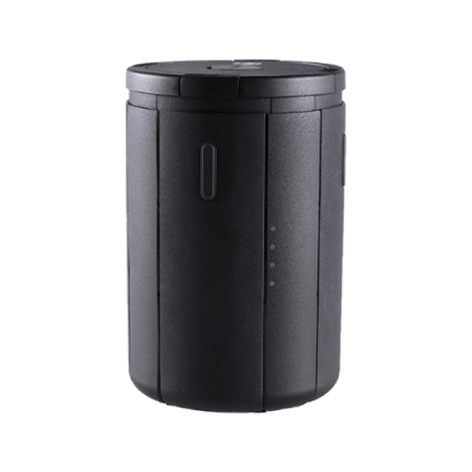 Black cylindrical container with a lid on a white background