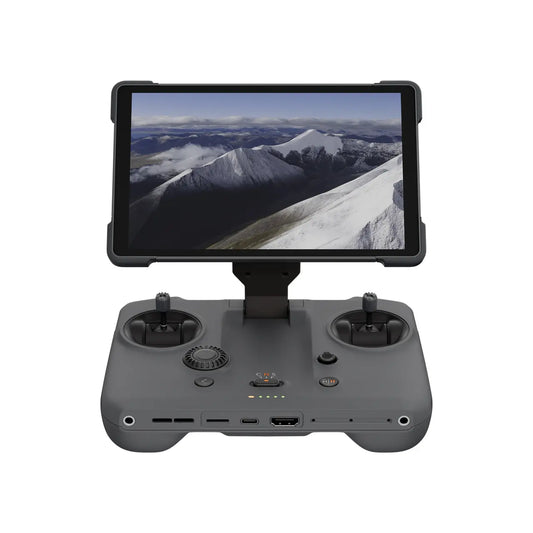 Drone controller with screen displaying a mountainous landscape on a white background