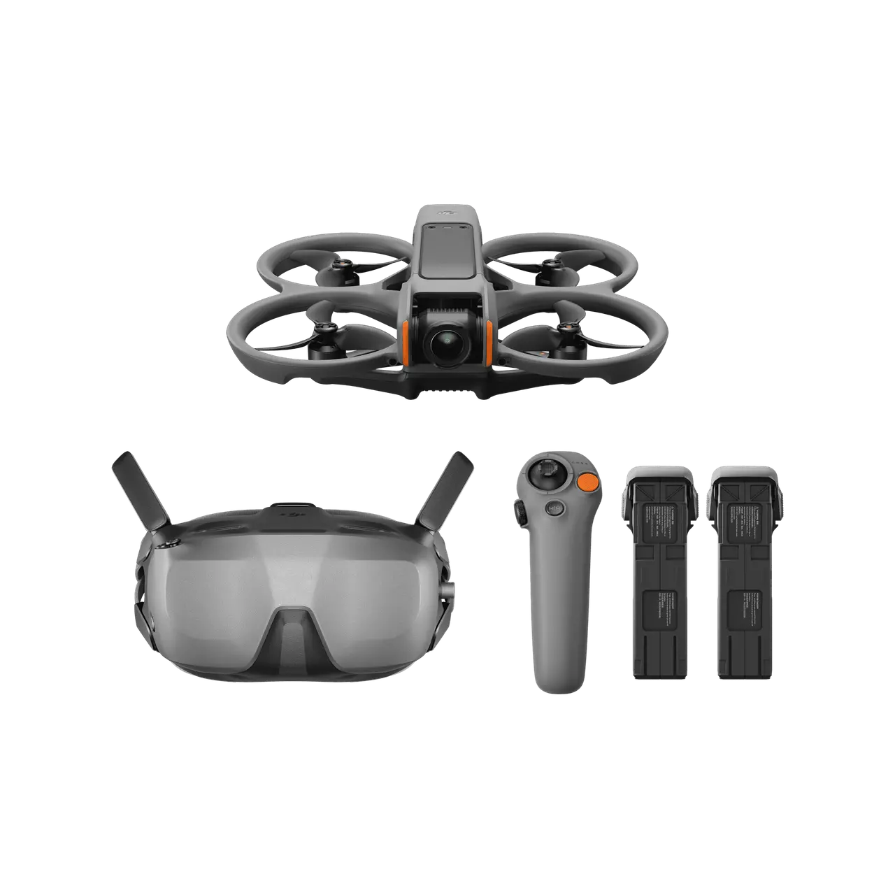Drone with goggles, remote control, and batteries on a white background