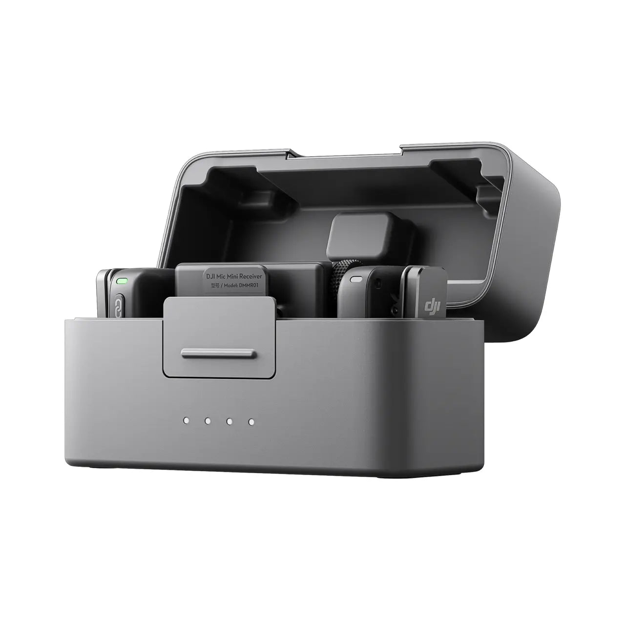 Gray DJI Mic Mini charging station with multiple electronic devices on a white background