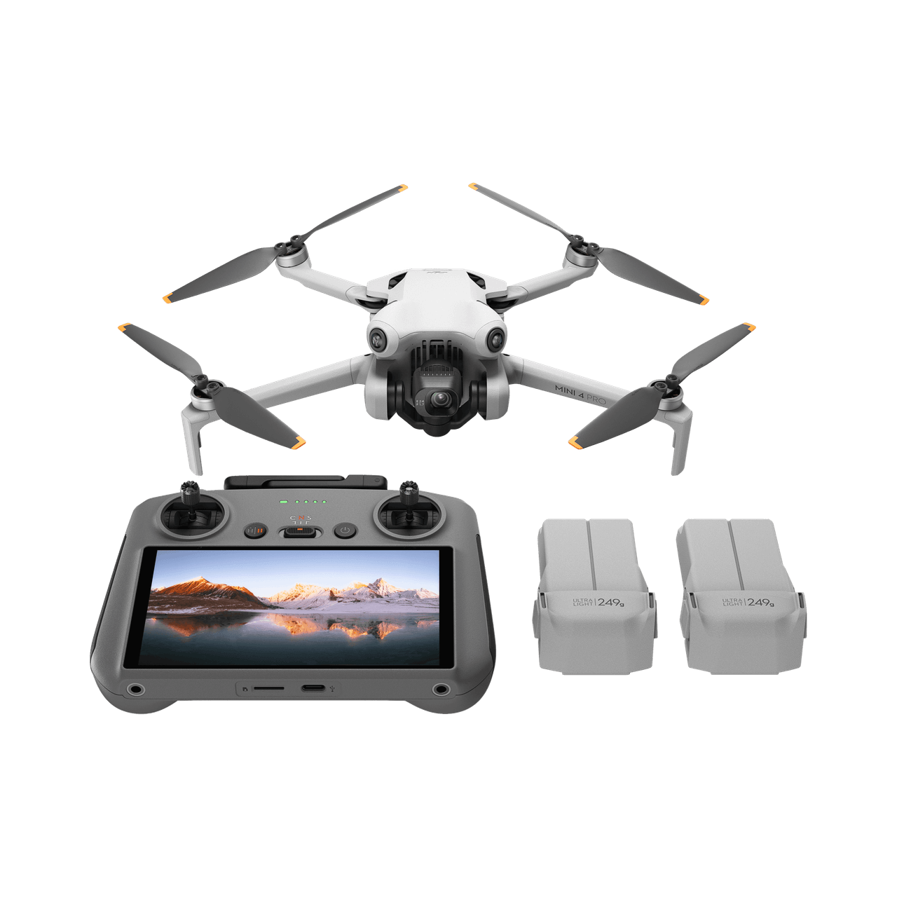 DJI mini 4 pro fly more Drone with remote control and batteries on a black background