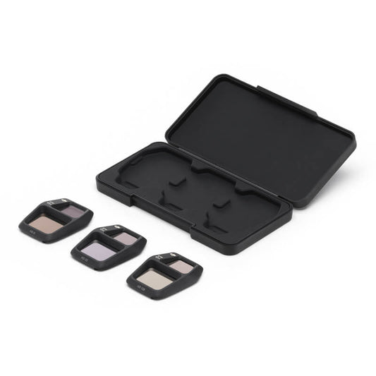 Black camera lens filter set with case on a white background