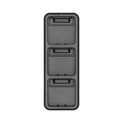 Gray electronic module with multiple connectors on a white background