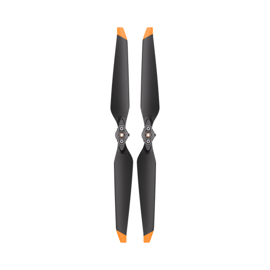 Two black propellers with orange tips on a white background