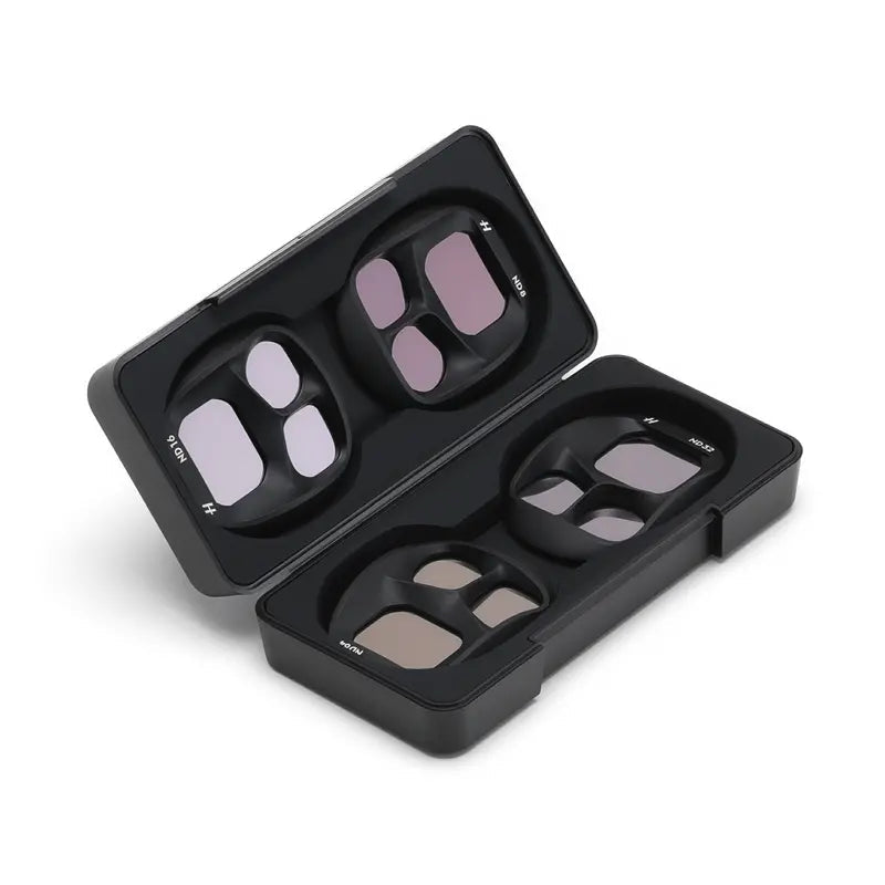 Set of eyeglass lenses in a black case on a white background