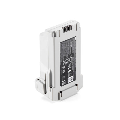 Metallic device with a label on a white background