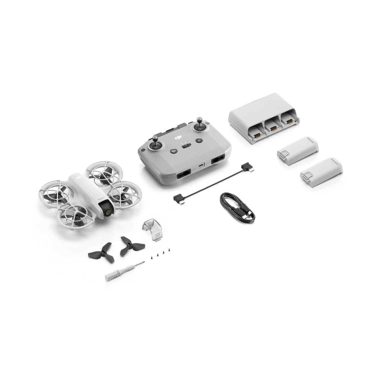 DJI Neo drone fly more combo kit with components on a white background