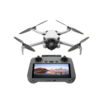 DJI mini 4 pro White drone with four propellers and a remote control device displaying a scenic view on a black background.