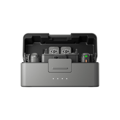 Gray battery charging station with DJI Mic 3 logo on a black background