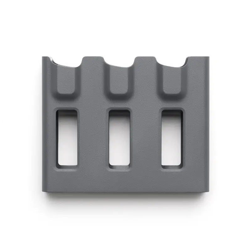 Gray plastic component on a white background
