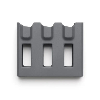 Gray plastic component on a white background