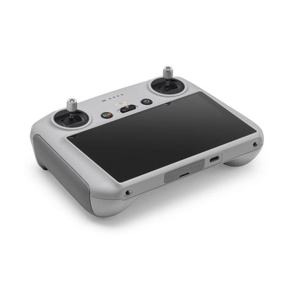 Drone controller with screen and joysticks on a white background