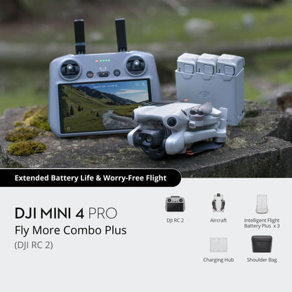 DJI Mini 4 Pro Fly More Combo Plus with remote control and accessories on a natural background