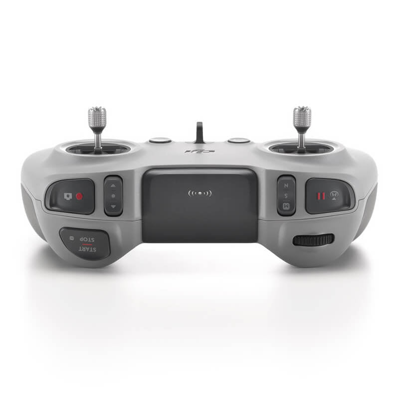 Gray remote control with joystick and buttons on a white background
