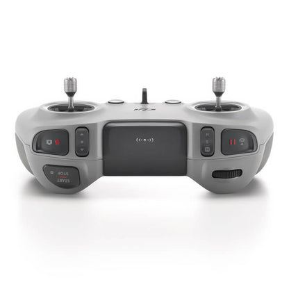 Gray remote control with joystick and buttons on a white background
