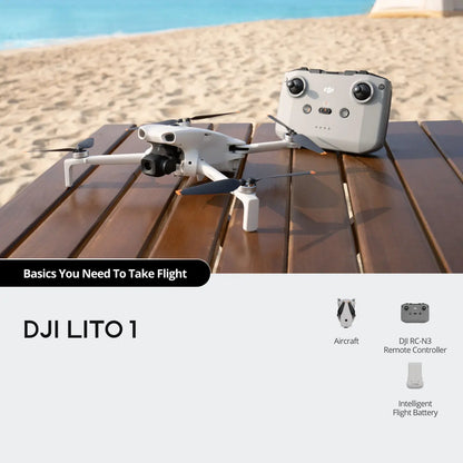 DJI LITO 1 drone and remote control on a wooden surface with beach background
