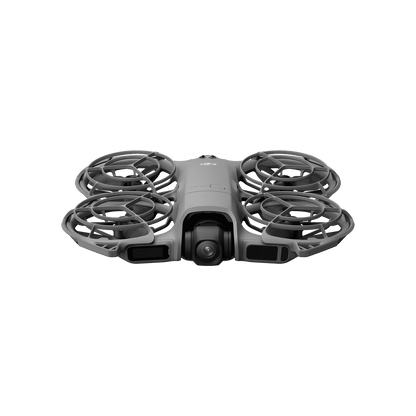Gray drone with four propellers on a black background