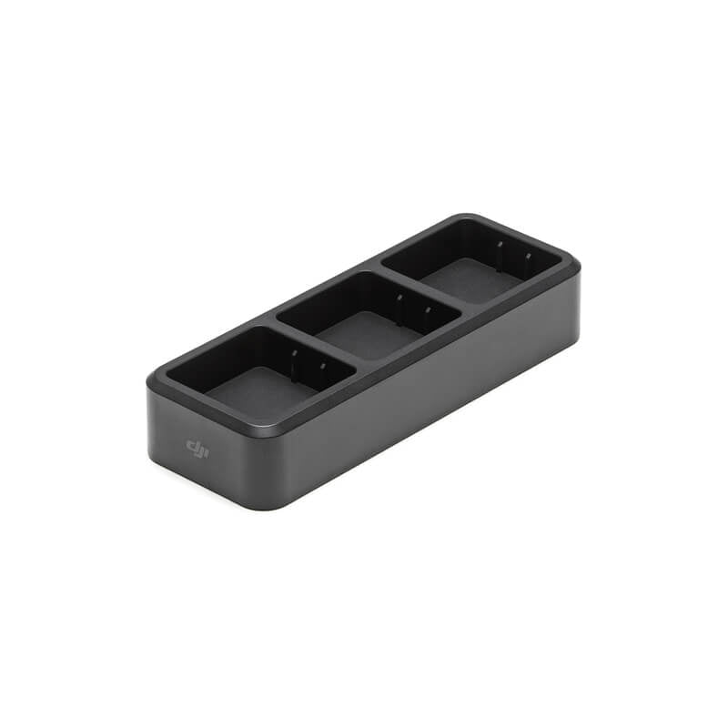 Black rectangular device with three compartments on a white background