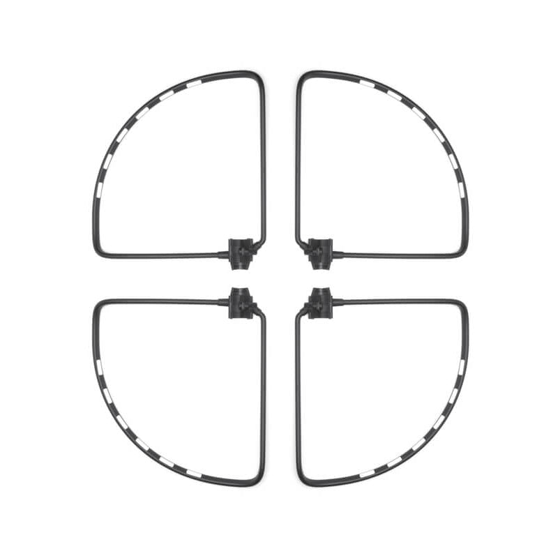 Four transparent drone propeller guards arranged in a cross pattern on a white background.