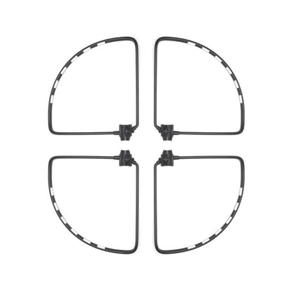 Four transparent drone propeller guards arranged in a cross pattern on a white background.
