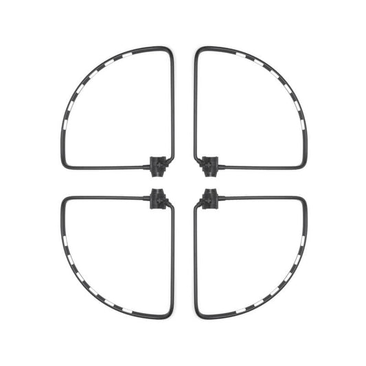 Four transparent drone propeller guards arranged in a cross pattern on a white background.