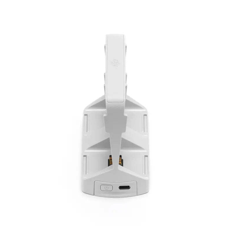 White electronic device with a cylindrical design on a white background