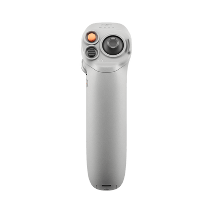White handheld device with buttons on a black background