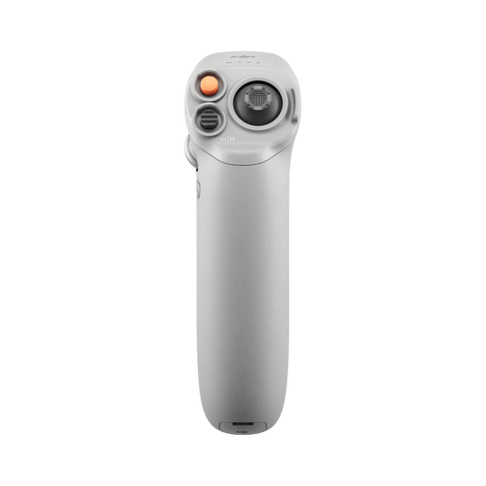 White handheld device with buttons on a black background