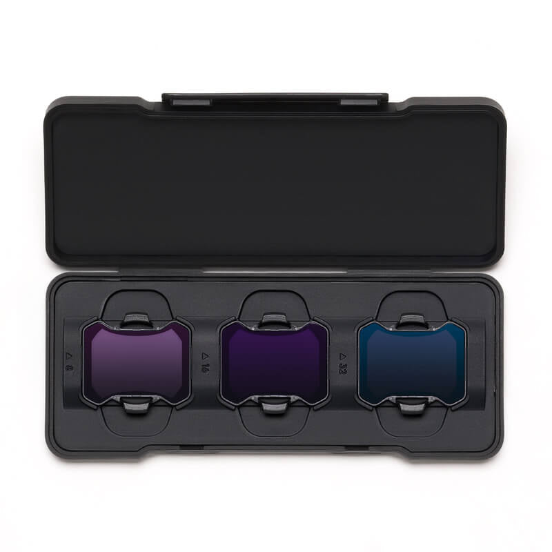 Black case with three colored filters inside on a white background