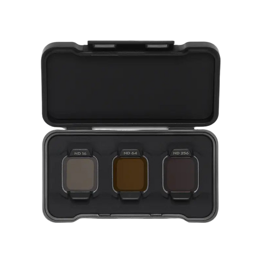 Black case with three color filters on a white background