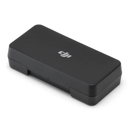 Black rectangular device with DJI logo on a white background