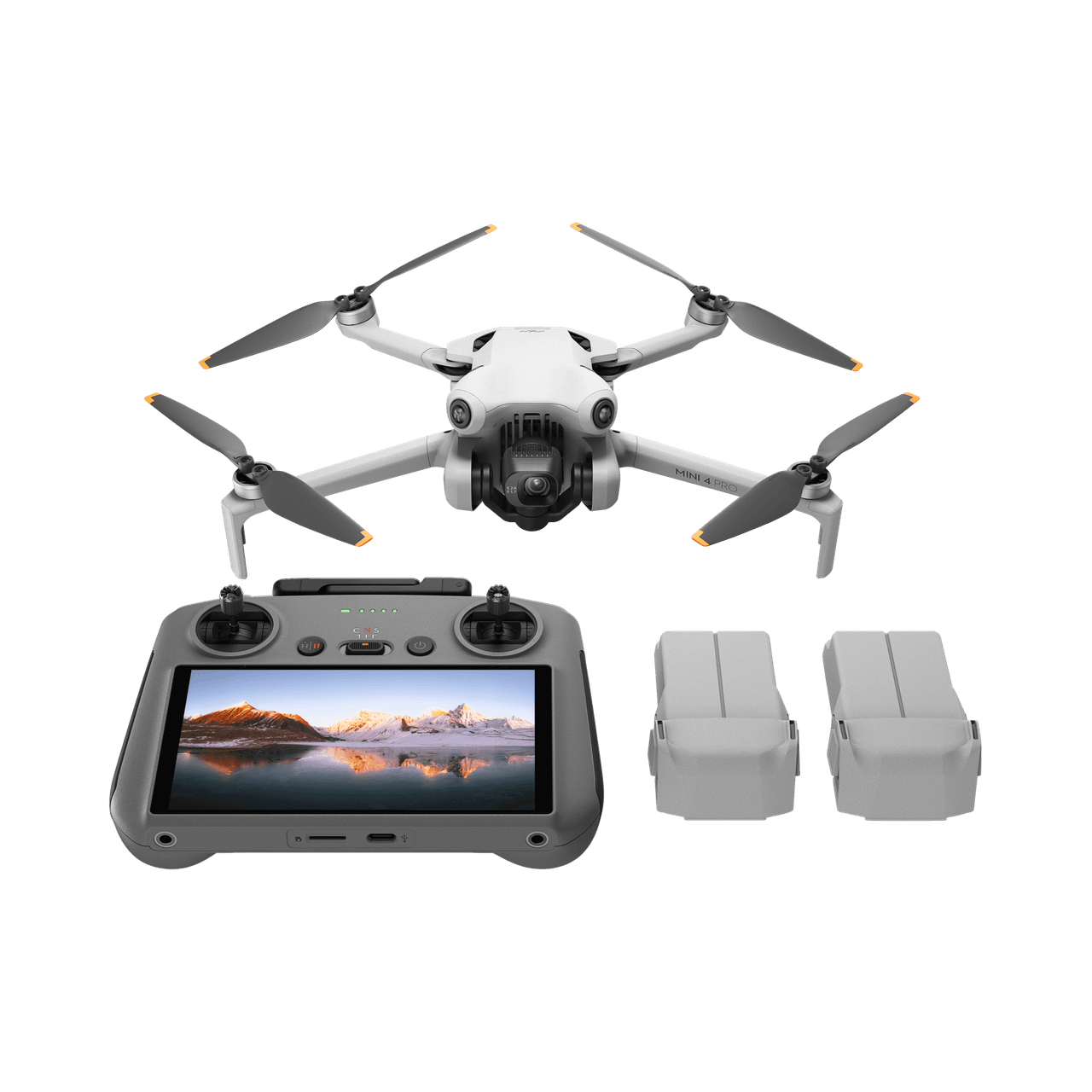 DJI mini 4 pro fly more plus Drone with remote control and batteries on a black background