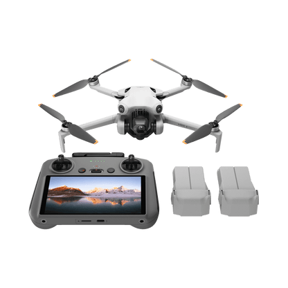 DJI mini 4 pro fly more plus Drone with remote control and batteries on a black background