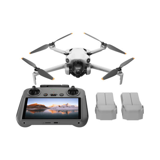 DJI mini 4 pro fly more plus Drone with remote control and batteries on a black background